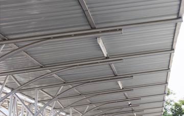 installing Mudgley metal roofing